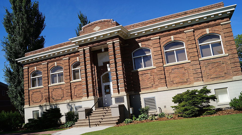 Exterior view of brown brick building.