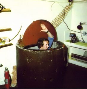 A steel hatch at the top of a vertical culvert with ladder formed the entrance to Art William’s underground laboratory for the manufacture of the psychedelic drug MDA, 1977.