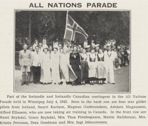 Black-and-white photo of the Icelandic and Icelandic Canadian group marching in the All Nations Parade in Winnipeg on July 4, 1942. The group includes men and women, some in traditional Icelandic dress, gathered around an Icelandic flag.