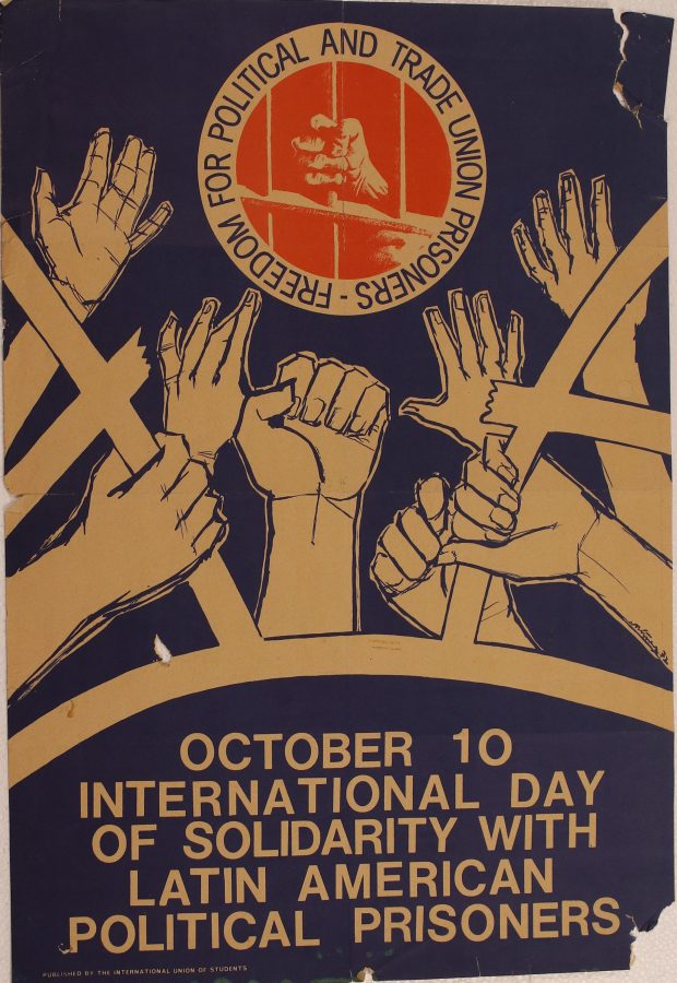 This poster has a blue background with white text that states October 10 International Day of Solidarity With Latin American Political Prisoners at the bottom of the page. Above the text is a graphic of a group of arms tearing open a cage. Above this image is an orange logo in the shape of a circle of a hand grasping a prison bar. Encircling the image is the text Freedom For Political And Trade Union Prisoners.
