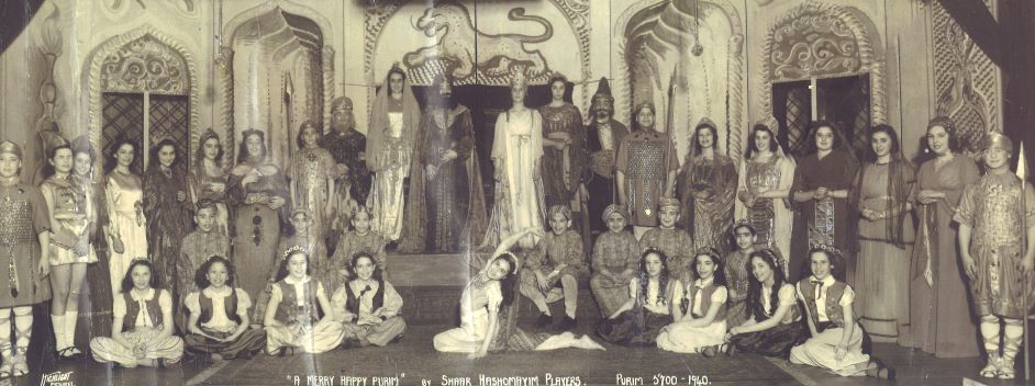 A black-and-white photograph of a group of children in costume for a play.