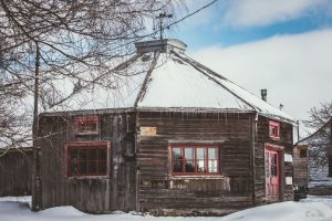 Octagonal-shaped wooden building.