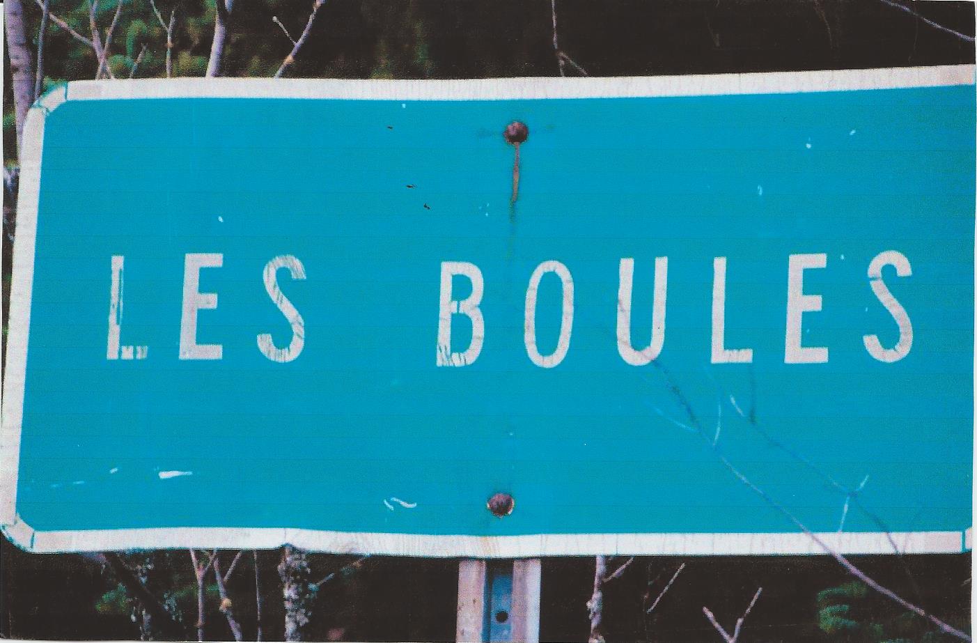 Colour photograph of the road sign presenting the town of Les Boules.