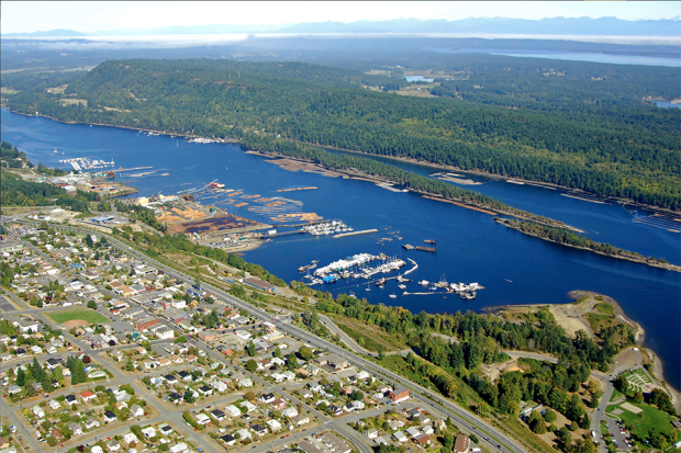 Colour oblique aerial photograph looking north over the town of Ladysmith and its harbour.